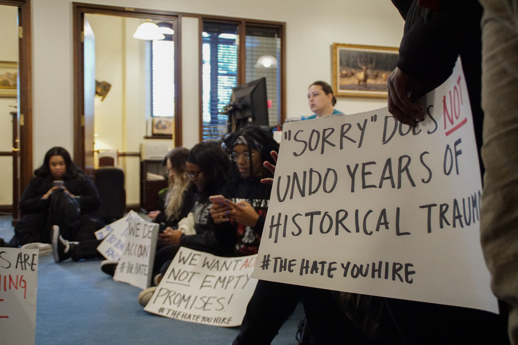 Sit-in sign